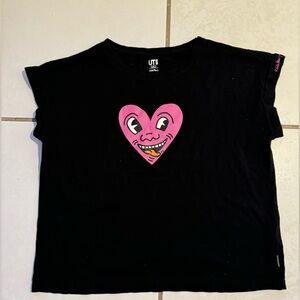 Uniqlo T-shirt with a bright heart in the center.